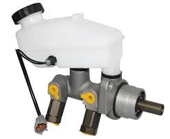 Automotive brake master cylinder with white fluid reservoir, black body, and yellow adjustment knobs